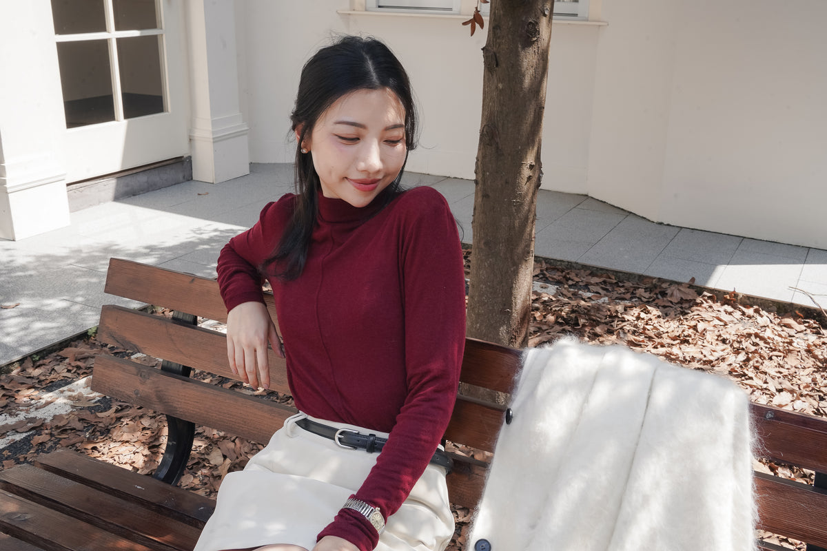 Burgundy Muse High-Neck Top, new version without waist ties, seated view